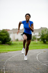 Woman running track